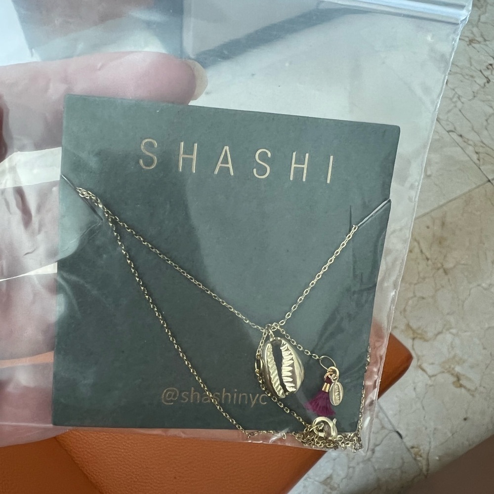 Sashi Gold Tone Shell Necklace - Picture 3 of 14